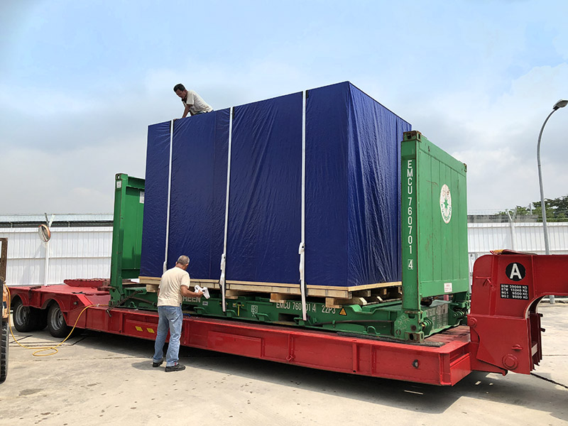 Popular Pack workers carrying out lashing job for container.